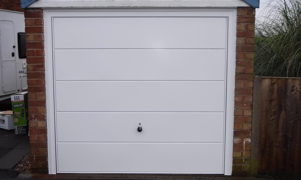 The Window Exchange: Up and Over Garage Doors